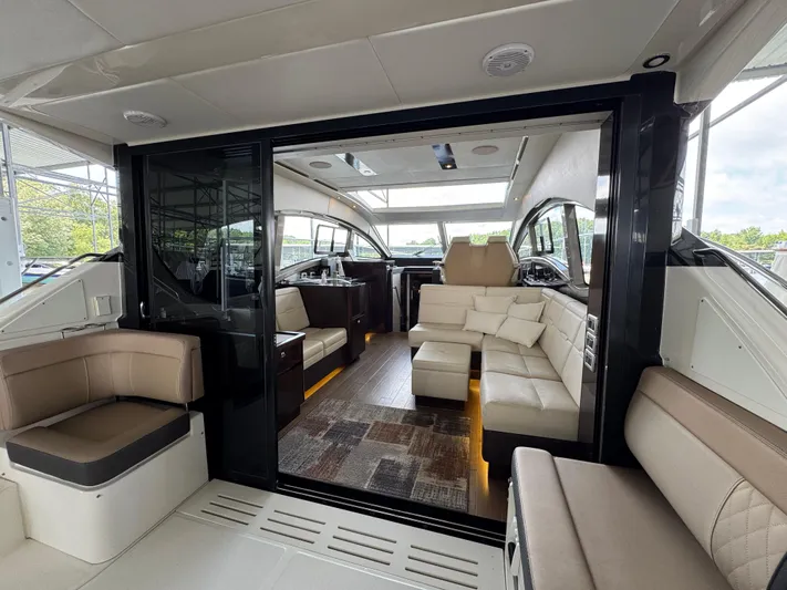 Finale Yacht Photos Pics Luxurious interior of 2017 Sea Ray Sundancer 400 yacht with plush seating and modern design.