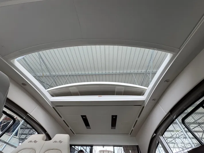 Finale Yacht Photos Pics 2017 Sea Ray Sundancer 400 interior with sunroof and luxurious seating.