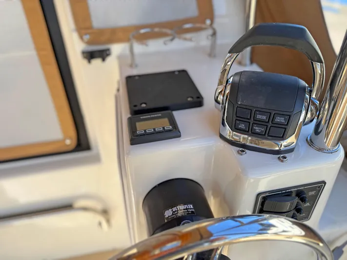 Salty Growler Yacht Photos Pics 2017 Ranger Tugs R-29 S helm controls with modern navigation equipment.