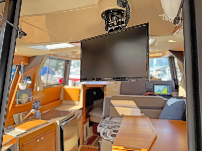 Salty Growler Yacht Photos Pics Interior of 2017 Ranger Tugs R-29 S with modern amenities and cozy seating.