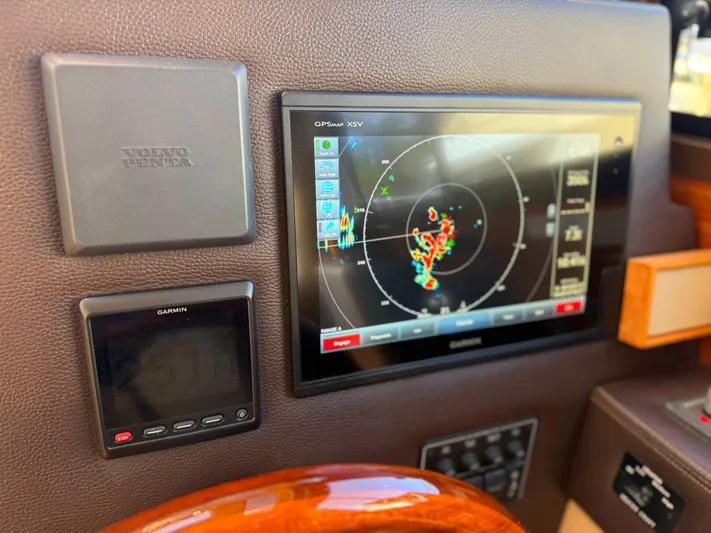 Salty Growler Yacht Photos Pics Control panel of 2017 Ranger Tugs R-29 S with Garmin navigation display.