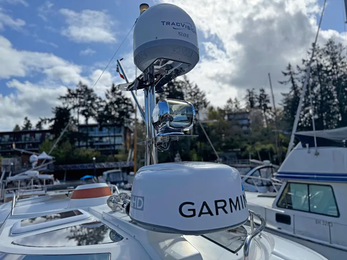 Salty Growler Yacht Photos Pics Ranger Tugs R-29 S 2017 boat with Garmin and TracVision equipment, docked in a marina.