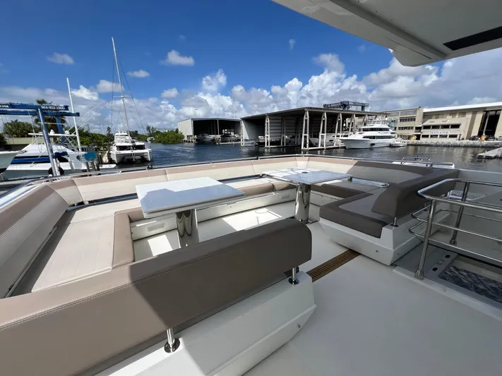  Yacht Photos Pics Luxurious seating area on 2020 Galeon 680 Fly yacht, docked at marina.