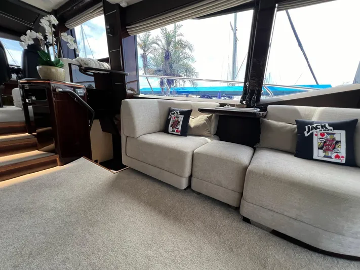  Yacht Photos Pics Luxurious interior of 2020 Galeon 680 Fly yacht with plush seating and decorative pillows.