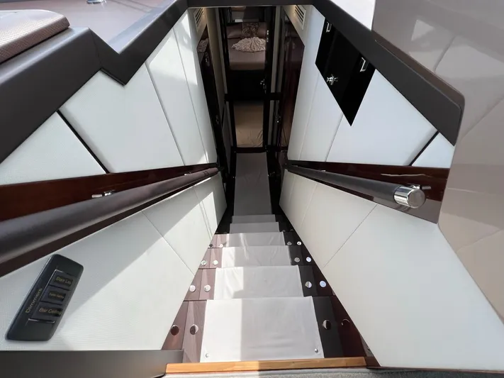  Yacht Photos Pics Staircase inside 2020 Galeon 680 Fly yacht, featuring sleek design and modern finishes.