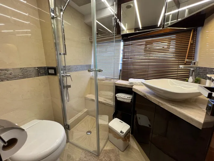  Yacht Photos Pics Luxurious bathroom in 2020 Galeon 680 Fly yacht with modern fixtures and elegant design.