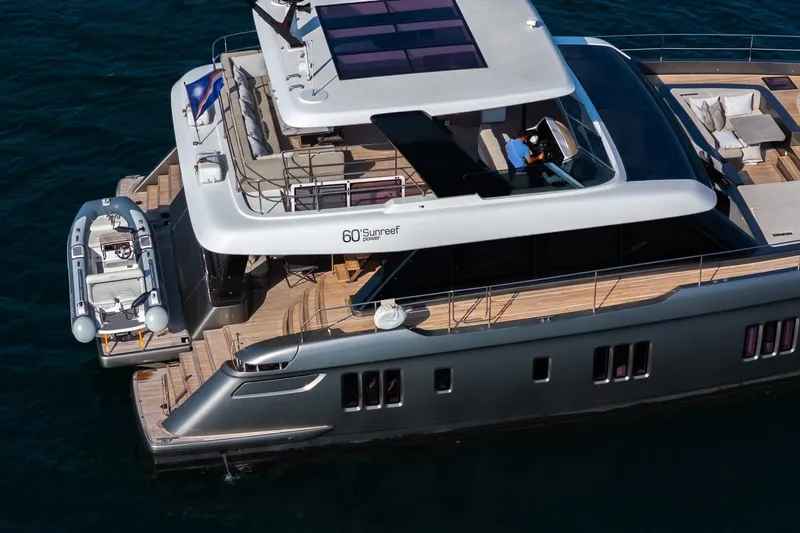  Yacht Photos Pics Luxurious 2023 Sunreef 60 Power yacht with spacious deck and modern design.