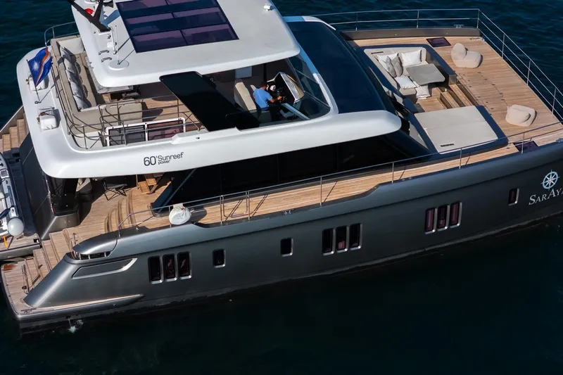  Yacht Photos Pics 2023 Sunreef 60 Power yacht with spacious deck and modern design.