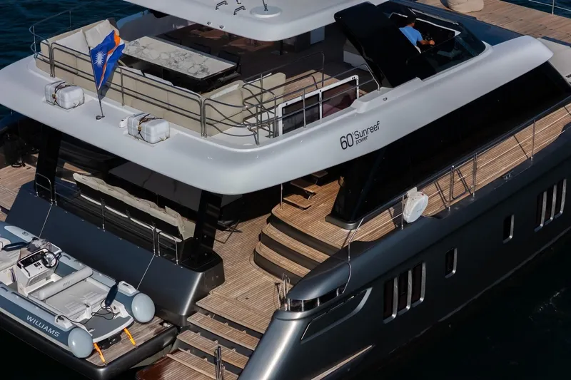  Yacht Photos Pics Luxurious 2023 Sunreef 60 Power yacht with elegant deck and modern design.
