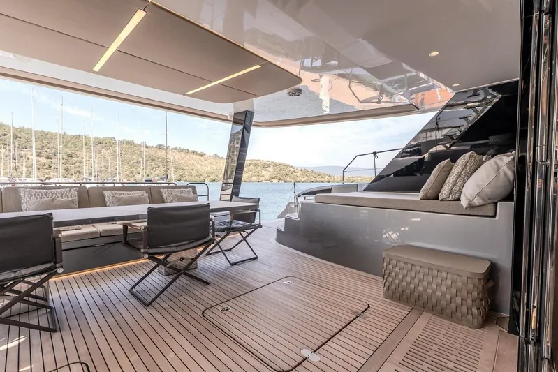  Yacht Photos Pics Luxurious Sunreef 60 Power yacht interior, 2023 model, featuring elegant seating and scenic ocean views.