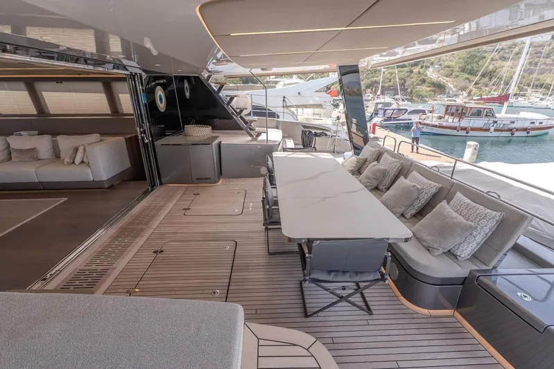  Yacht Photos Pics Luxurious Sunreef 60 Power yacht interior, featuring elegant seating and dining area, 2023 model.