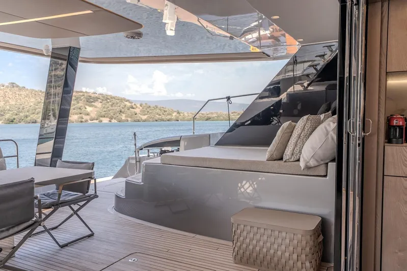  Yacht Photos Pics Luxurious Sunreef 60 Power yacht interior with elegant seating and scenic ocean view, 2023 model.