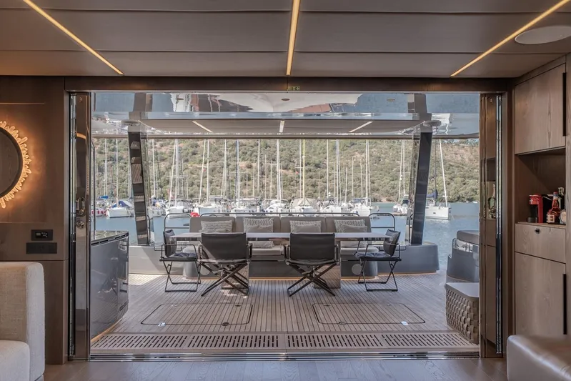  Yacht Photos Pics Luxurious interior of 2023 Sunreef 60 Power yacht with marina view.