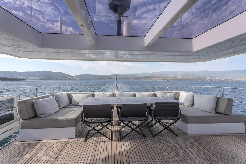  Yacht Photos Pics Luxurious Sunreef 60 Power yacht deck with seating, ocean view, 2023 model.