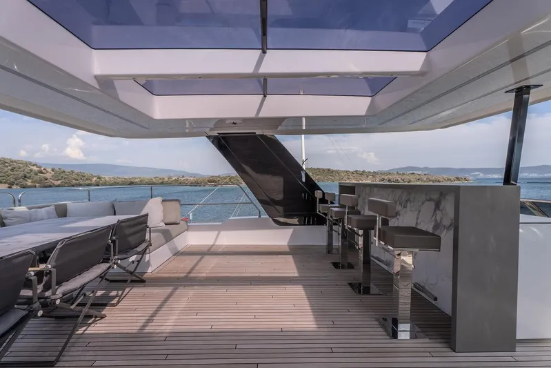  Yacht Photos Pics Luxurious Sunreef 60 Power yacht interior with modern seating and panoramic ocean views, 2023 model.