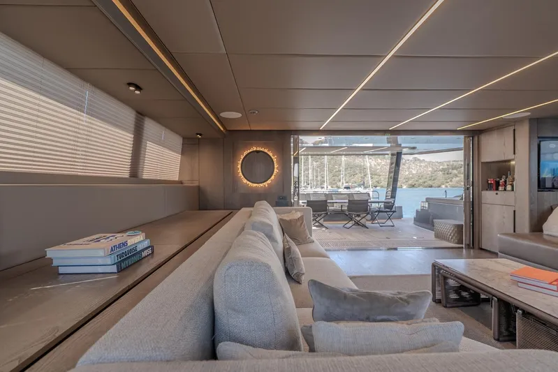  Yacht Photos Pics Luxurious interior of 2023 Sunreef 60 Power yacht with modern decor and scenic ocean view.