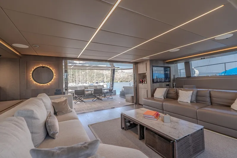  Yacht Photos Pics Luxurious interior of 2023 Sunreef 60 Power yacht with modern seating and elegant decor.