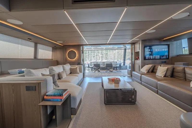  Yacht Photos Pics Luxurious interior of 2023 Sunreef 60 Power yacht with modern seating and elegant decor.