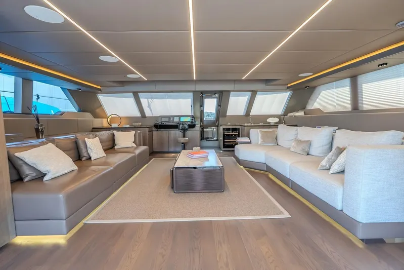  Yacht Photos Pics Luxurious interior of 2023 Sunreef 60 Power yacht with modern seating and elegant decor.