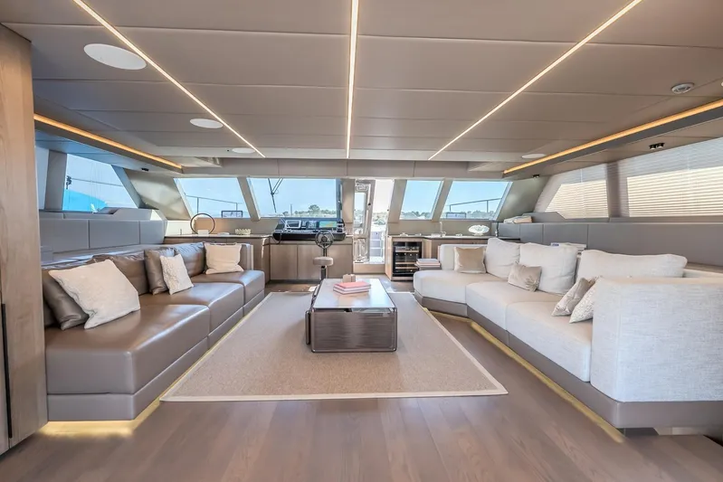  Yacht Photos Pics Luxurious interior of 2023 Sunreef 60 Power yacht with modern seating and elegant decor.
