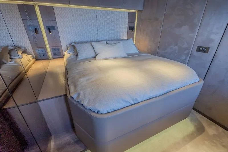  Yacht Photos Pics Luxurious bedroom interior of 2023 Sunreef 60 Power yacht with modern design.