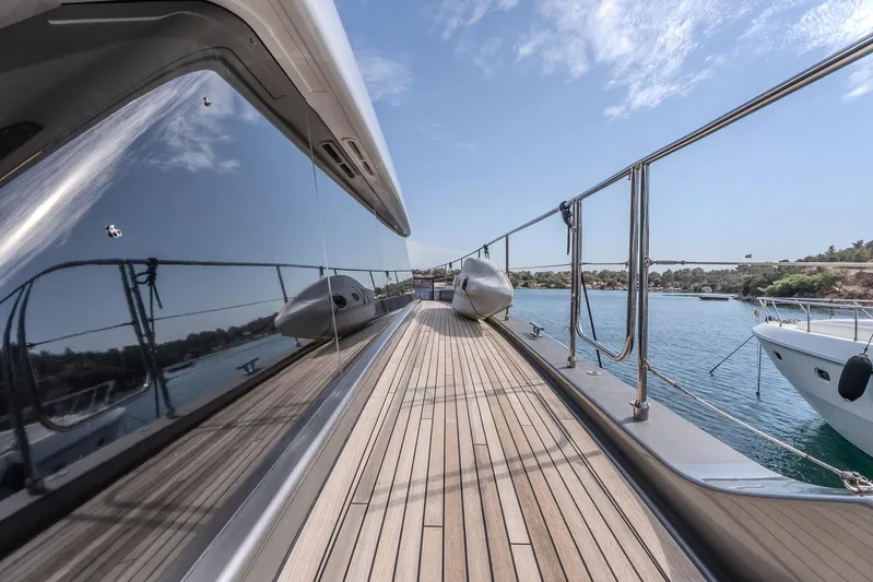  Yacht Photos Pics Luxurious Sunreef 60 Power yacht deck, 2023 model, with sleek design and scenic ocean view.