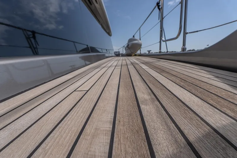  Yacht Photos Pics Sunreef 60 Power 2023 yacht deck with sleek wooden finish and modern design.