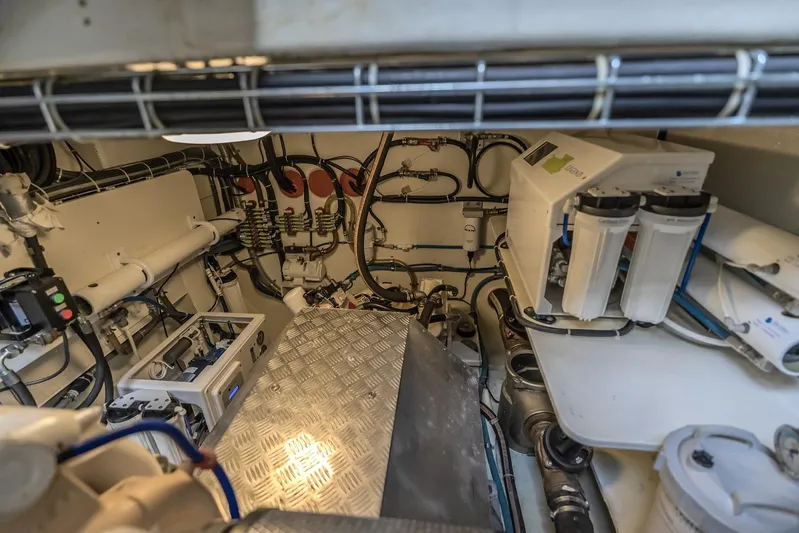  Yacht Photos Pics Engine room of 2023 Sunreef 60 Power yacht, showcasing complex machinery and piping systems.