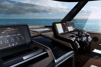  Yacht Photos Pics 2025 Fjord 53 XL yacht cockpit with advanced navigation systems and ocean view.