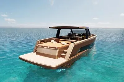  Yacht Photos Pics 2025 Fjord 53 XL luxury yacht on clear blue water, showcasing sleek design and spacious deck.