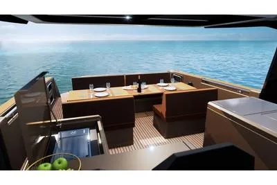  Yacht Photos Pics Luxurious 2025 Fjord 53 XL yacht interior with elegant dining area overlooking the ocean.