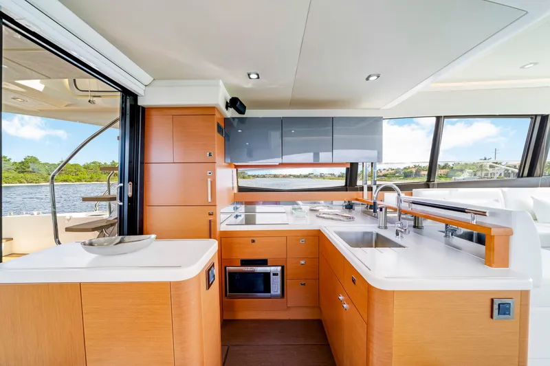 Our Trade Yacht Photos Pics Luxurious 2017 Prestige 560 yacht kitchen with modern design and scenic water views.
