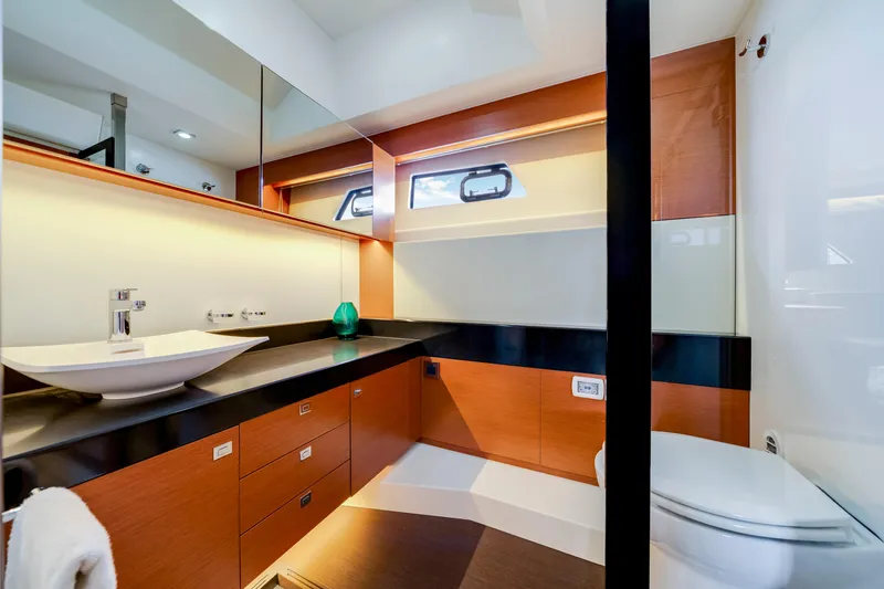 Our Trade Yacht Photos Pics Luxurious bathroom interior on a 2017 Prestige 560 yacht, featuring modern fixtures and elegant design.