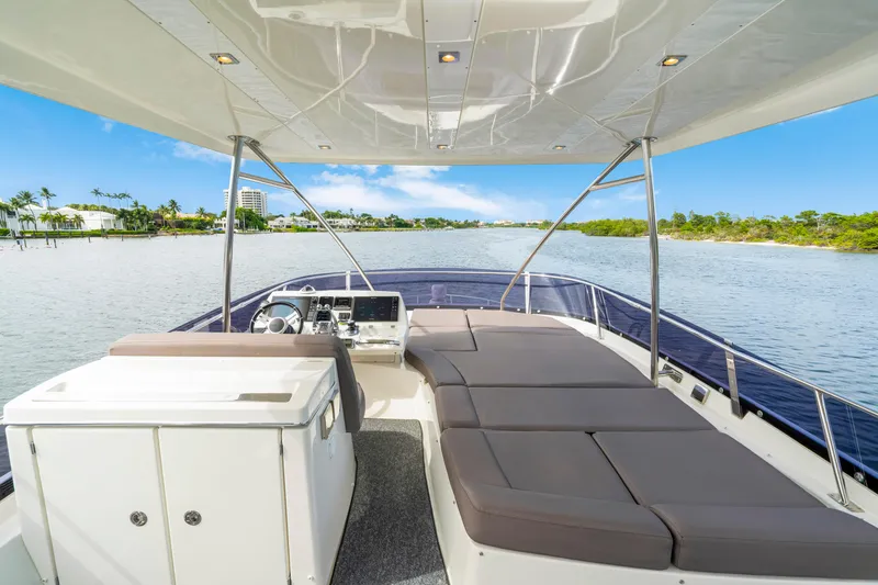 Our Trade Yacht Photos Pics Luxurious 2017 Prestige 560 yacht interior with spacious seating and scenic water view.