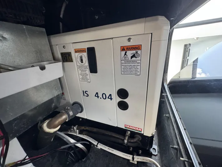  Yacht Photos Pics Engine compartment of a 2023 Yellowfin 42 boat, featuring a Yanmar IS 4.04 engine.