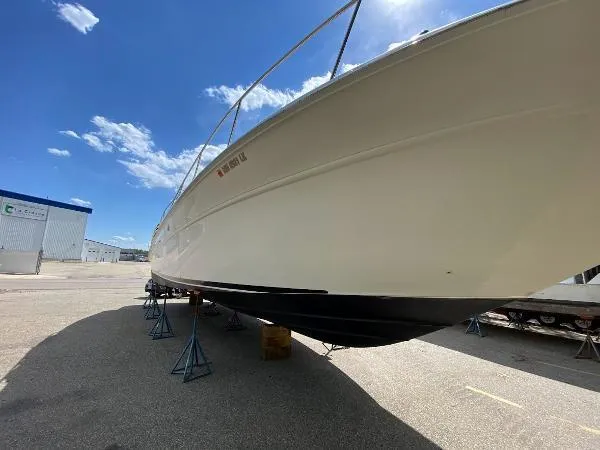 Fresh Water 450 Sundancer Yacht Photos Pics 1997 Sea Ray 450 Sundancer yacht on stands, clear sky background.