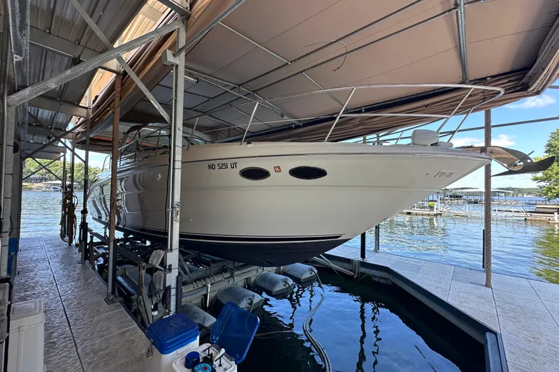  Yacht Photos Pics 2004 Sea Ray 380 Sundancer docked in a covered marina slip.