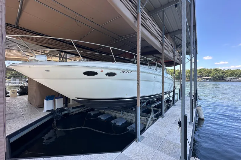  Yacht Photos Pics 2004 Sea Ray 380 Sundancer docked in a covered marina slip.