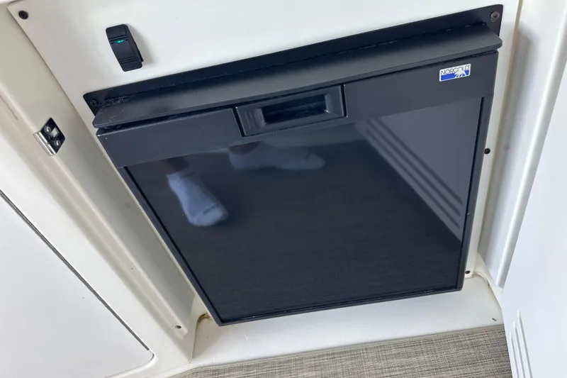  Yacht Photos Pics Black Norcold refrigerator on a 2004 Sea Ray 380 Sundancer boat.