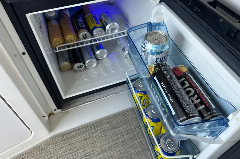  Yacht Photos Pics Mini fridge stocked with beverages on a 2004 Sea Ray 380 Sundancer boat.