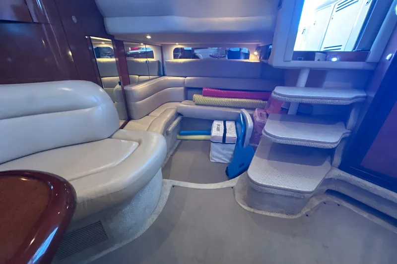  Yacht Photos Pics Interior of 2004 Sea Ray 380 Sundancer yacht with plush seating and carpeted steps.