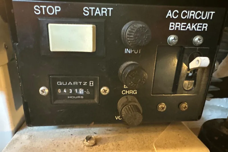  Yacht Photos Pics Control panel of a 2004 Sea Ray 380 Sundancer with hour meter and circuit breaker.