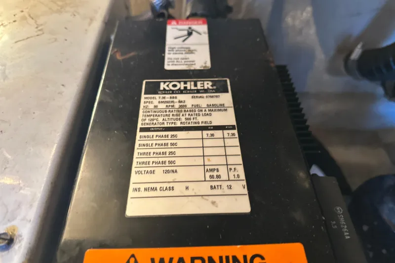  Yacht Photos Pics Kohler generator label on 2004 Sea Ray 380 Sundancer, displaying specifications and warnings.