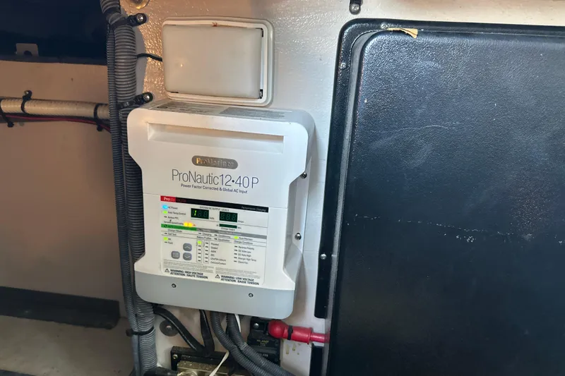  Yacht Photos Pics ProNautic 12:40P charger in 2004 Sea Ray 380 Sundancer boat engine room.