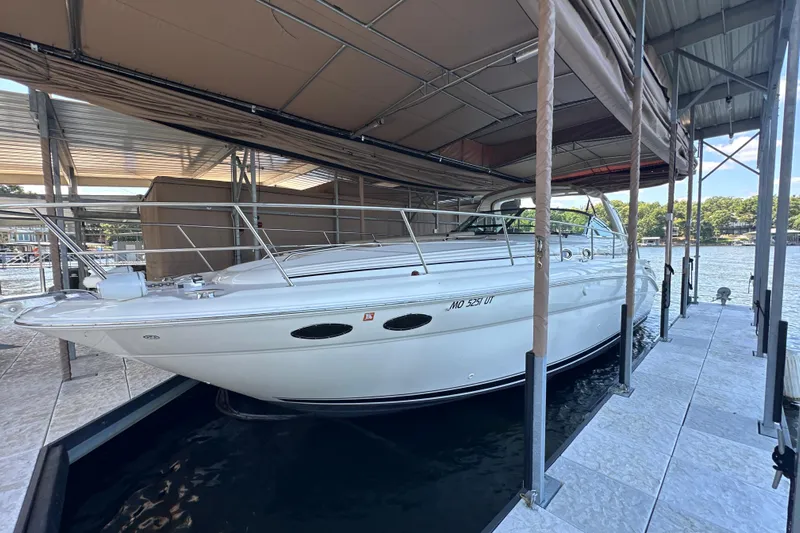  Yacht Photos Pics 2004 Sea Ray 380 Sundancer docked in a covered marina slip.