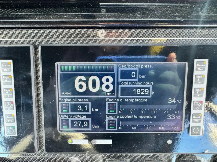  Yacht Photos Pics Dashboard of a 2010 Riva Vertigo 63 showing engine metrics and running hours.