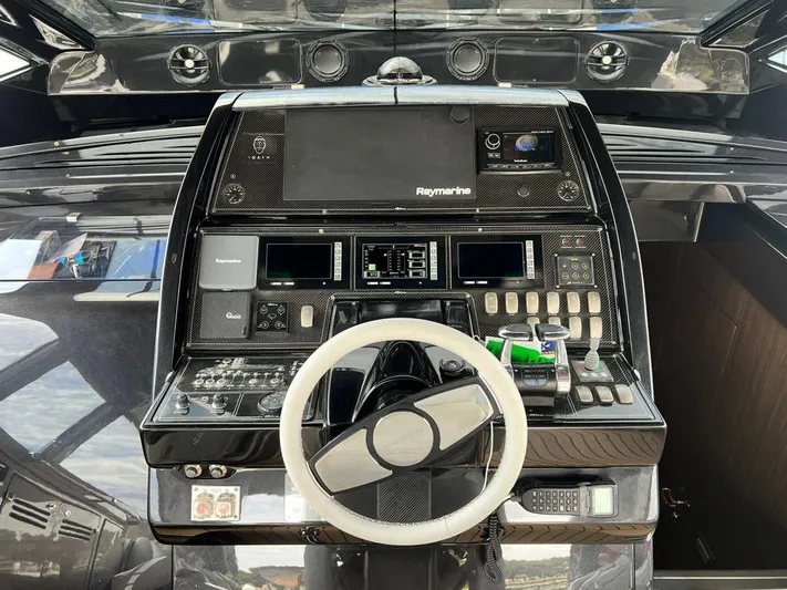  Yacht Photos Pics Cockpit of 2010 Riva Vertigo 63 yacht with advanced navigation controls.