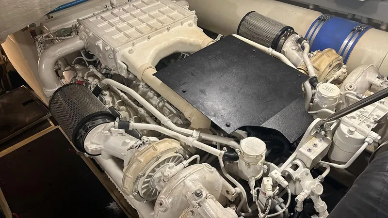  Yacht Photos Pics Engine compartment of a 2010 Riva Vertigo 63 yacht, showcasing intricate mechanical components.