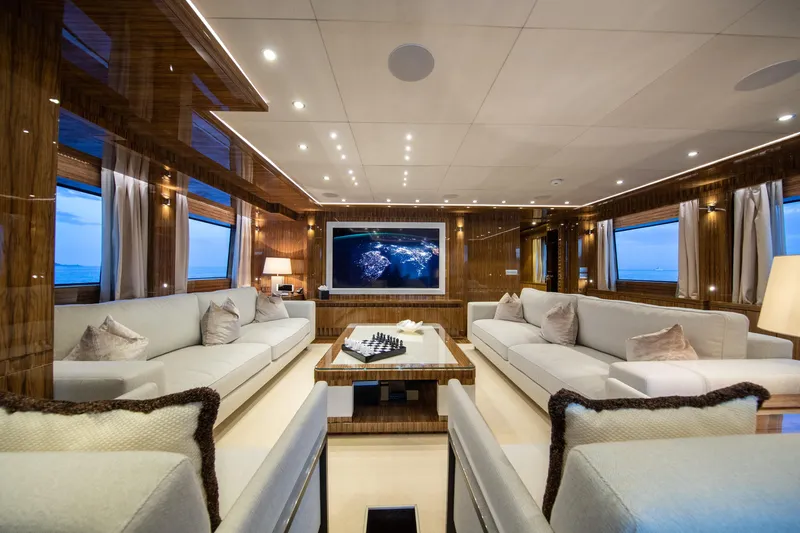 Okko Yacht Photos Pics Luxurious interior of 2013 Mondomarine 41M yacht with elegant seating and large windows.
