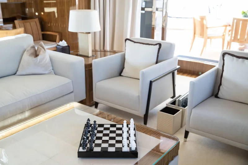 Okko Yacht Photos Pics Luxurious Mondomarine 41M yacht interior with elegant seating and chess set, 2013 model.
